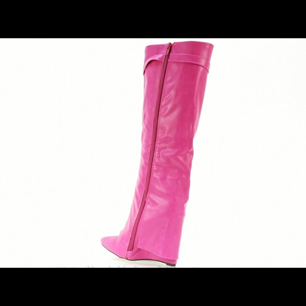 Brand new -wedge heel boots. Never worn.